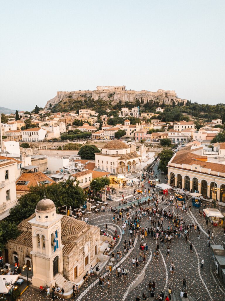 The modern view of Athens with Acropolis in the background. Athens considered to be few ancient cities that survive and where modern development coexist with its rich history