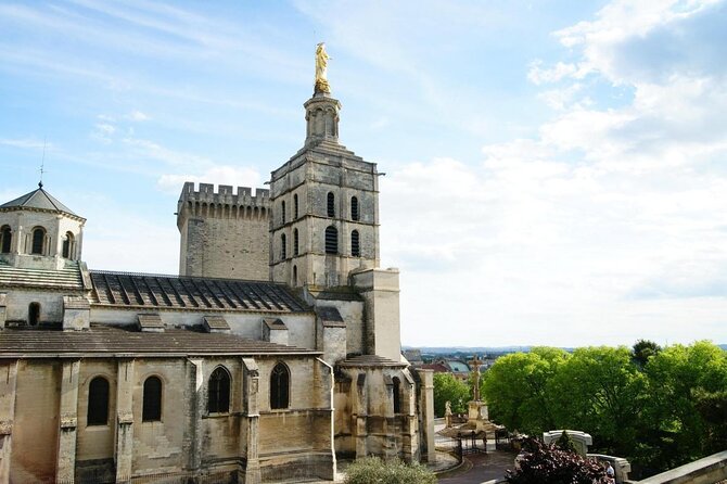 Avignon Cathedral with Virgin Mary statue on the bell tower