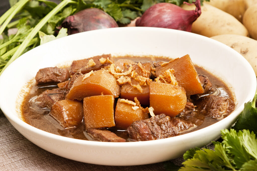 Indonesian Semur served with braised meat and potato
